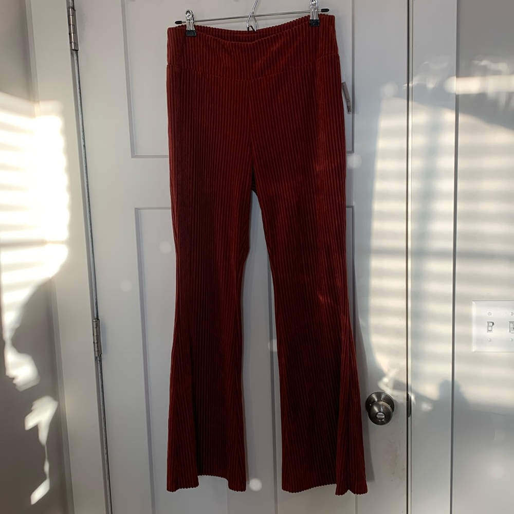 NWT orange flare pants, velvety material